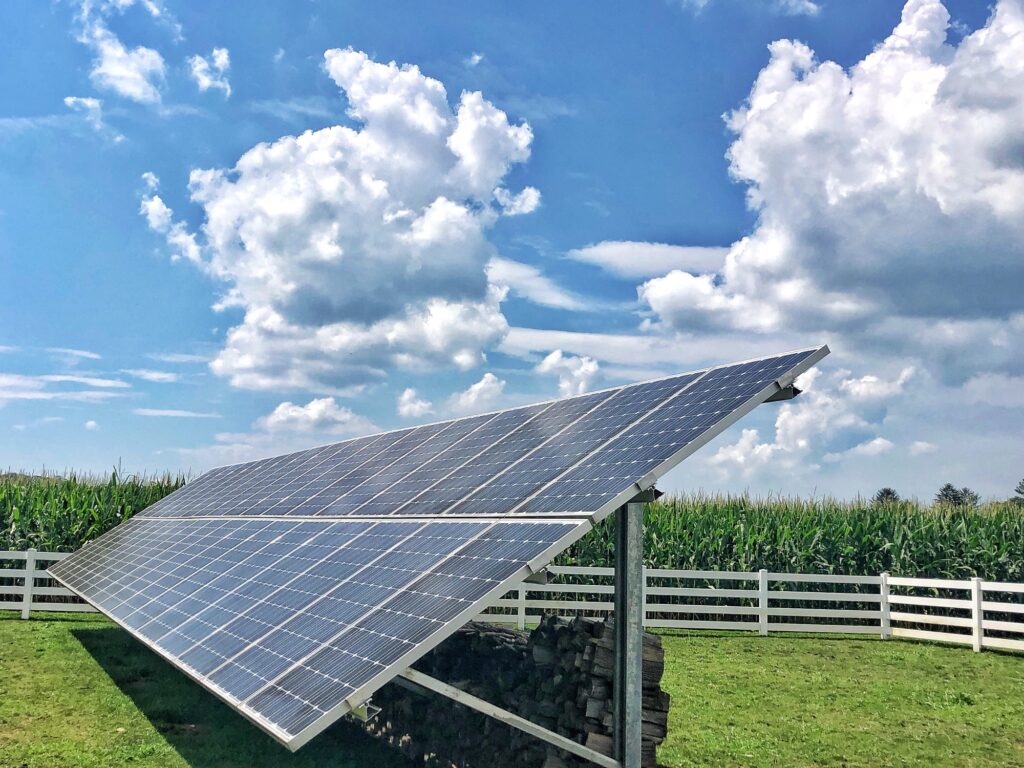 Engineer analyzing energy audit report on tablet